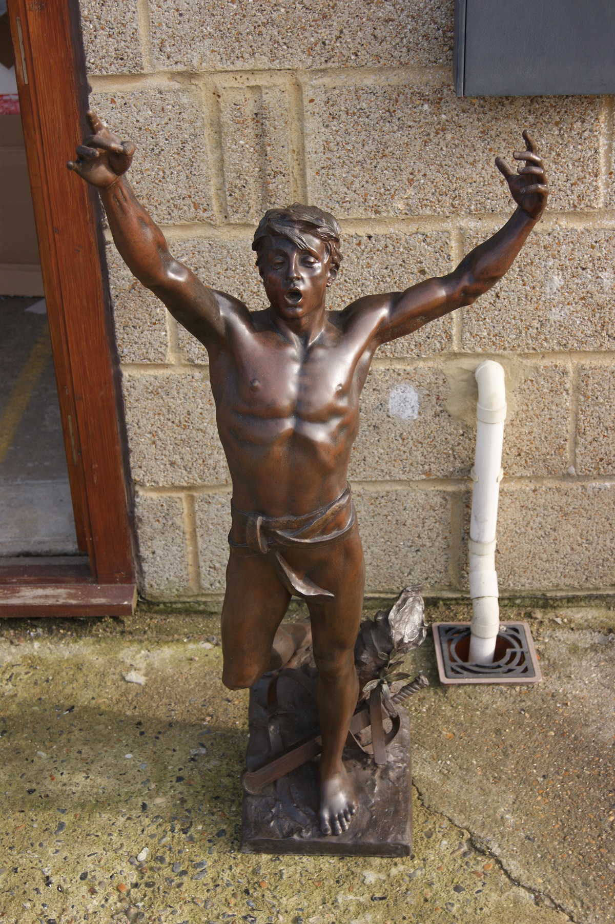 Bronze with arm repaired